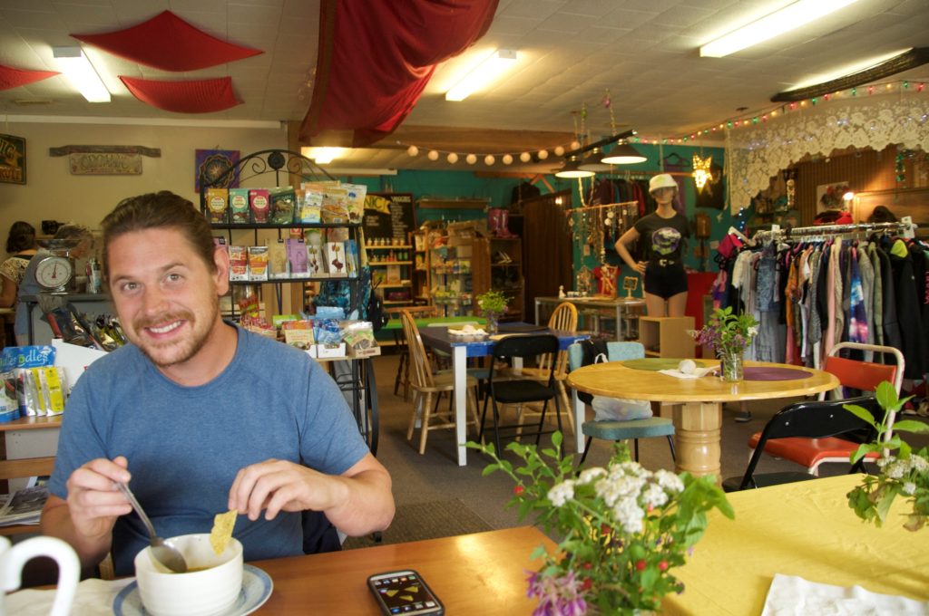 Matt looking hesitant as I take a picture of him eating lunch in Green Gaia